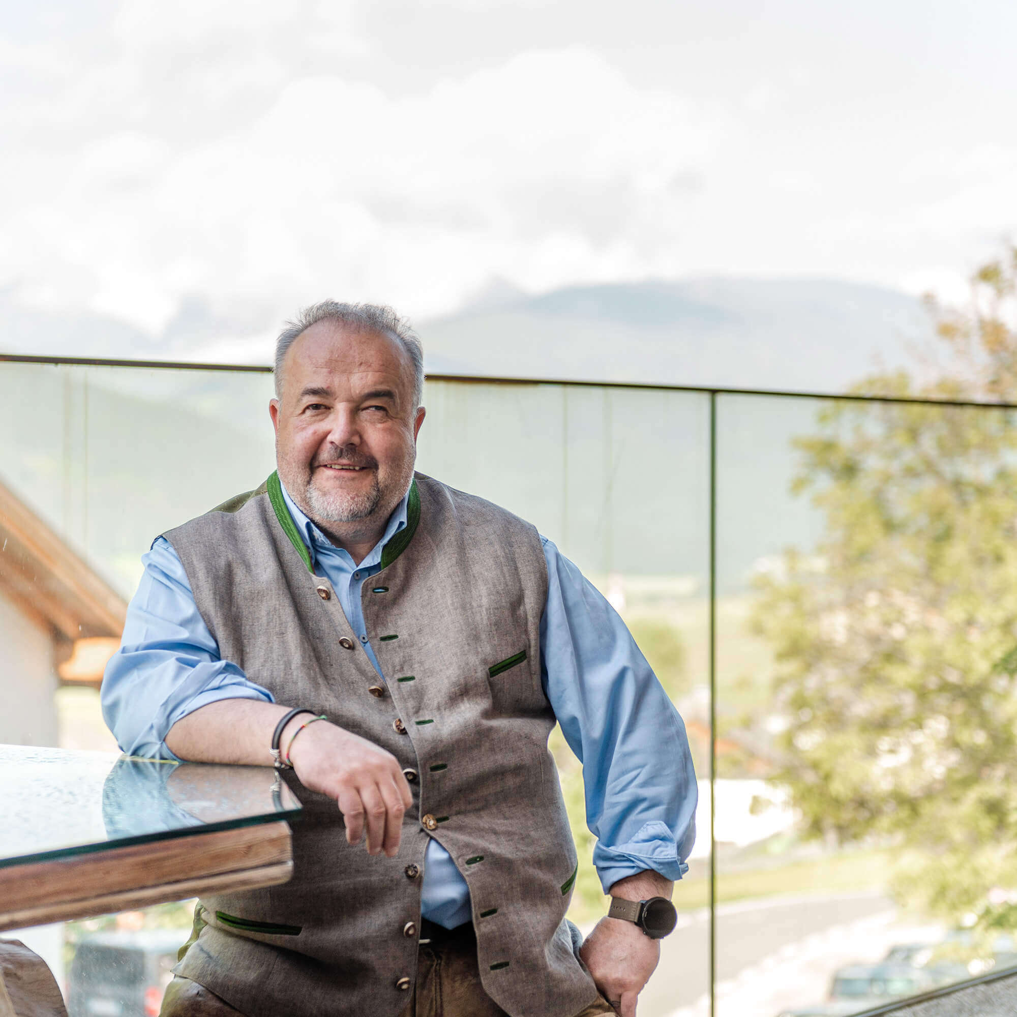 Fredi sits on the terrace at the Hotel Kirchenwirt